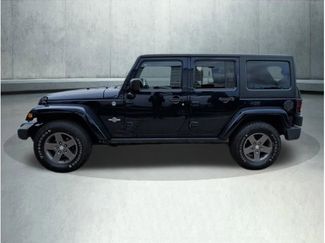 Used 2013 Jeep Wrangler Unlimited Sport video 2