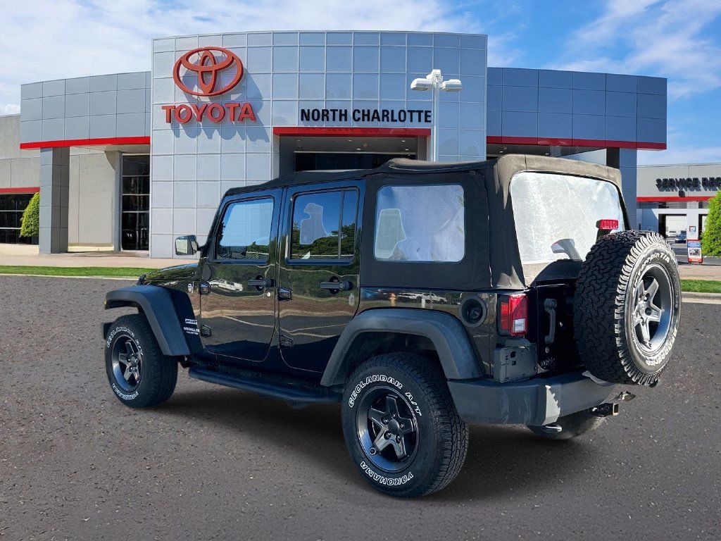 Used 2011 Jeep Wrangler Unlimited Sport w/ Trailer Tow Group AWD/4WD image 4