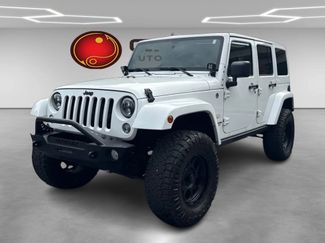 Used 2012 Jeep Wrangler Unlimited Sahara w/ Dual Top Group video 1