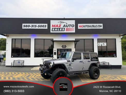 Used 2013 Jeep Wrangler Unlimited Sport AWD/4WD image 1