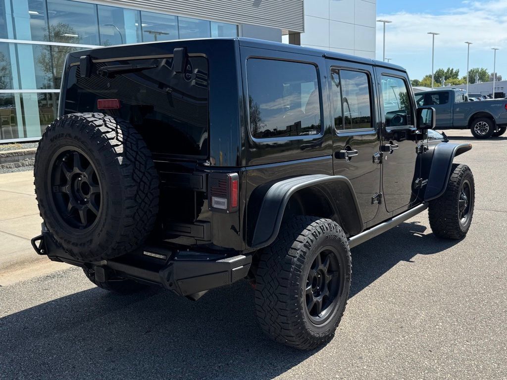 Used 2016 Jeep Wrangler Unlimited Rubicon w/ Dual Top Group AWD/4WD image 32