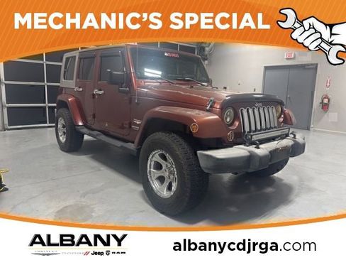 Used 2007 Jeep Wrangler Unlimited Sahara w/ Dual Top Group RWD image 1