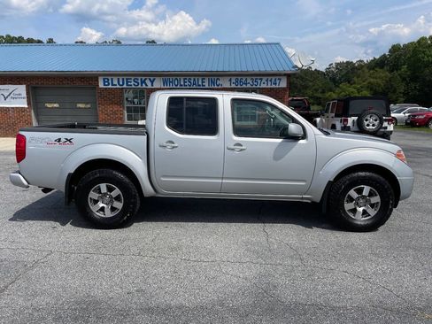 Used 2012 Nissan Frontier PRO-4X image 1