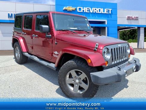 Used 2012 Jeep Wrangler Unlimited Sport AWD/4WD image 1