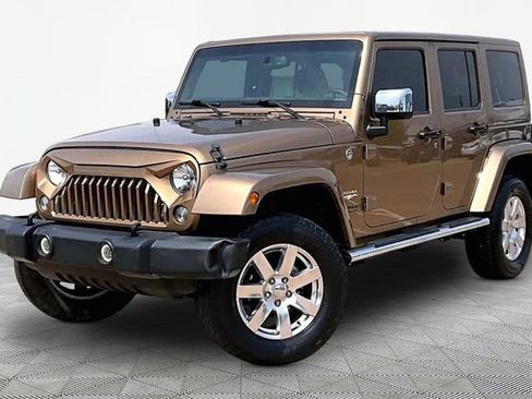 Used 2015 Jeep Wrangler Unlimited Sahara w/ Mopar Chrome Edition Group AWD/4WD image 1