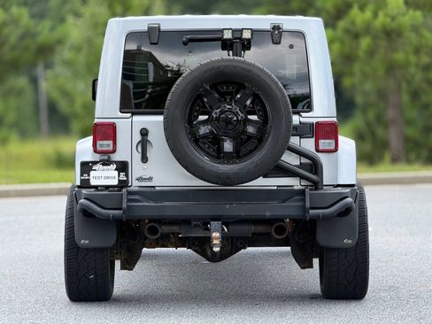 Used 2014 Jeep Wrangler Unlimited Rubicon w/ Dual Top Group AWD/4WD image 6