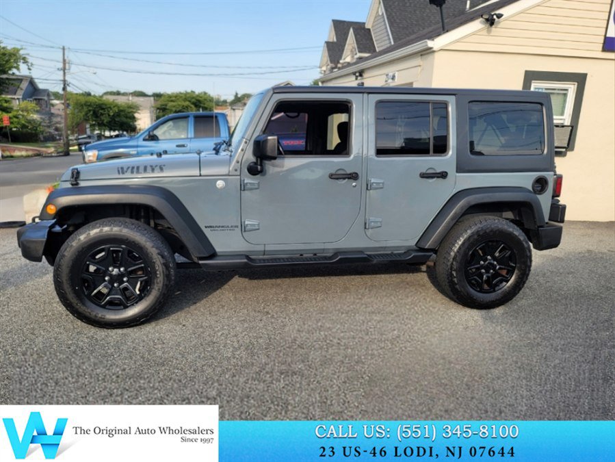 Used 2015 Jeep Wrangler Unlimited Sport w/ Dual Top Group AWD/4WD image 8