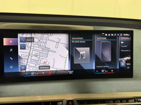 Used 2023 BMW iX xDrive50 w/ BMW I Signature Blue Package AWD/4WD image 27