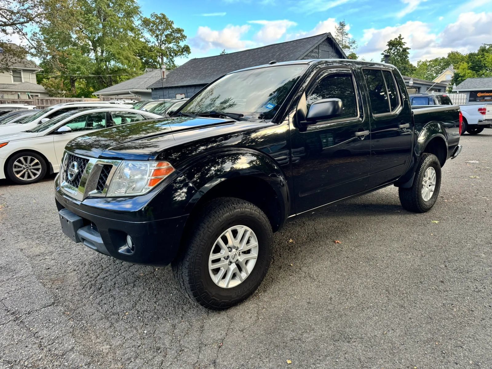 Used 2014 Nissan Frontier SV w/ SV Value Truck Package AWD/4WD image 1