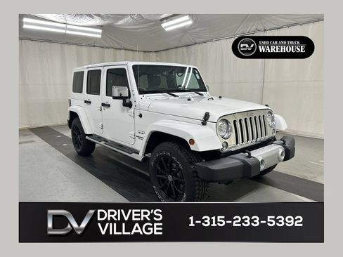 Used 2017 Jeep Wrangler Unlimited Sahara w/ Dual Top Group AWD/4WD image 1