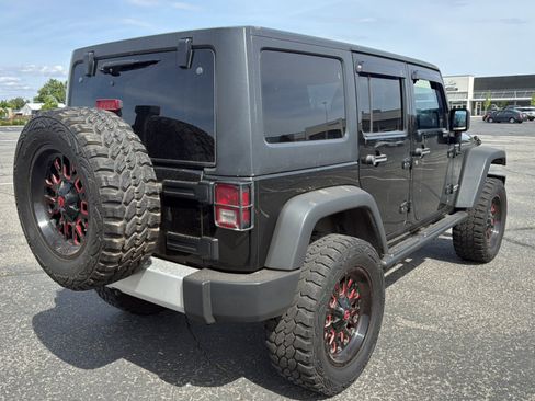 Used 2012 Jeep Wrangler Unlimited Sport w/ Black Appearance Group AWD/4WD image 14