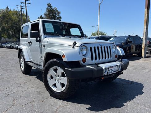Used 2012 Jeep Wrangler Sahara AWD/4WD image 1