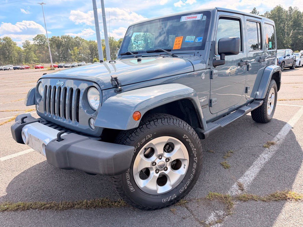 Used 2014 Jeep Wrangler Unlimited Sahara w/ Dual Top Group AWD/4WD image 2