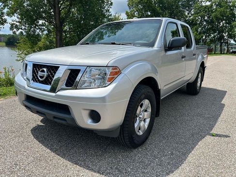 Used 2012 Nissan Frontier SV w/ SV Premium Utility Pkg AWD/4WD image 1