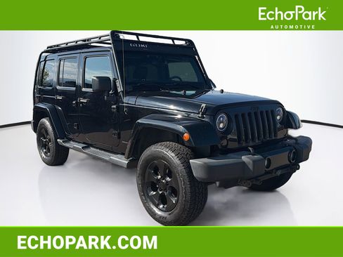 Used 2014 Jeep Wrangler Unlimited Sahara AWD/4WD image 1