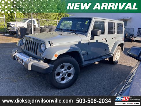 Used 2015 Jeep Wrangler Unlimited Sahara AWD/4WD image 1