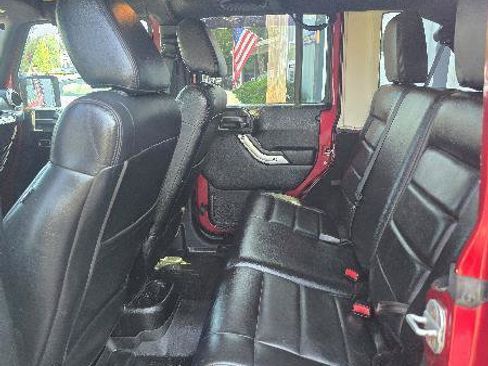 Used 2012 Jeep Wrangler Unlimited Sahara w/ Dual Top Group AWD/4WD image 6