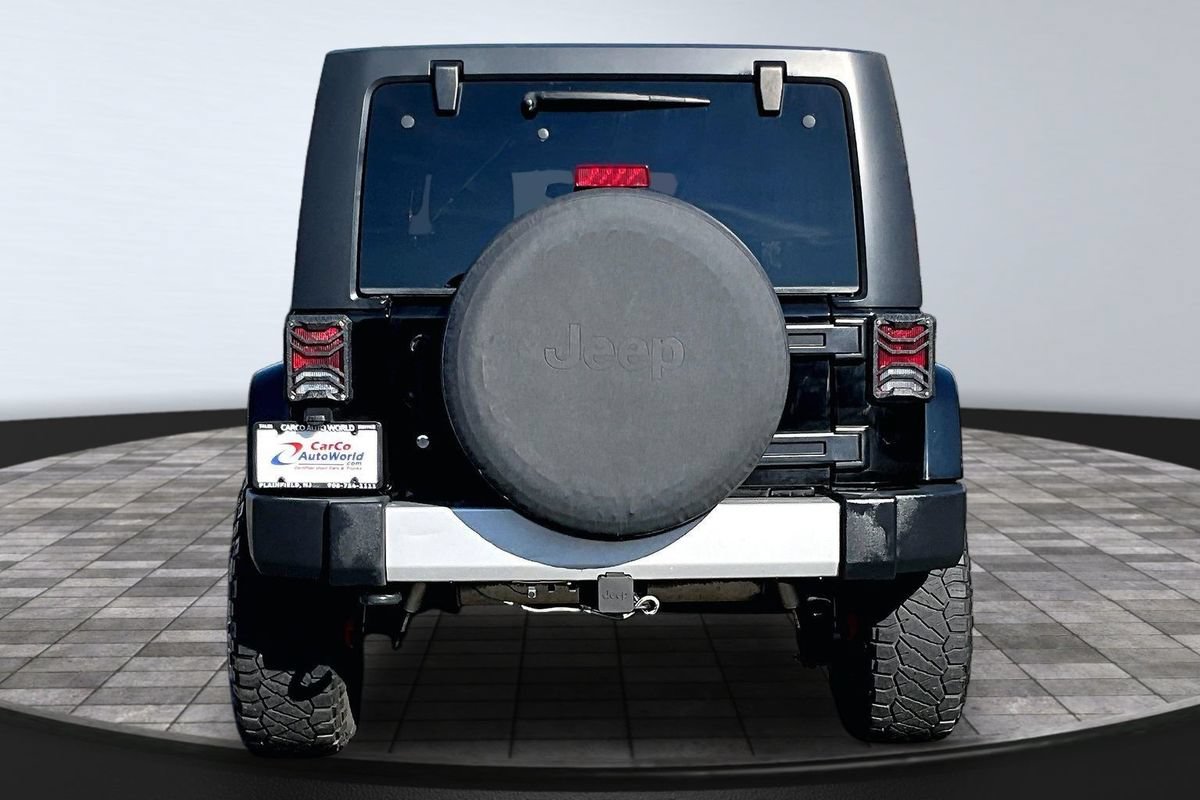 Used 2012 Jeep Wrangler Unlimited Sahara w/ Dual Top Group AWD/4WD image 6