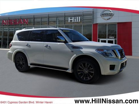 Certified 2019 Nissan Armada Platinum w/ Captain's Chairs Package AWD/4WD image 1