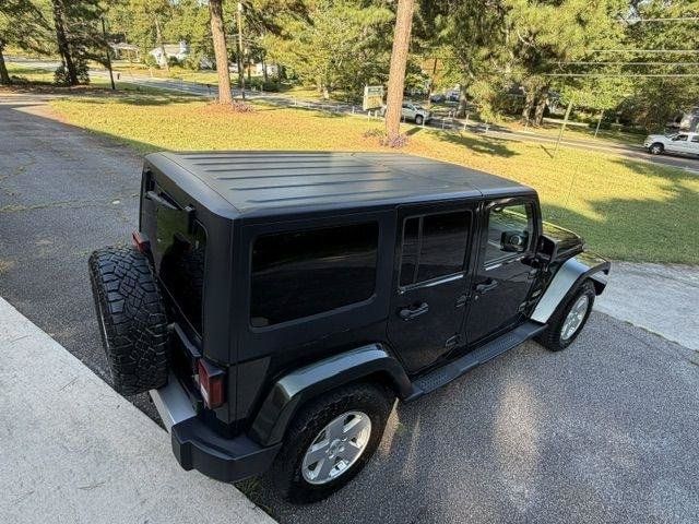 Used 2011 Jeep Wrangler Unlimited Sahara w/ Connectivity Group AWD/4WD image 7