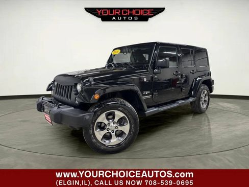 Used 2016 Jeep Wrangler Unlimited Sahara AWD/4WD image 1