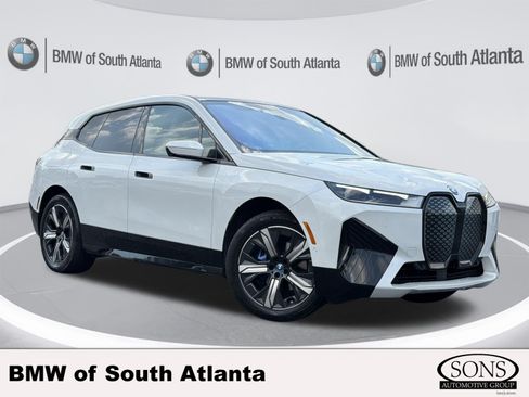 Used 2024 BMW iX xDrive50 w/ Premium Package AWD/4WD image 1
