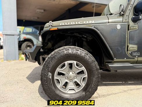 Used 2015 Jeep Wrangler Unlimited Rubicon w/ Dual Top Group AWD/4WD image 12