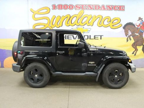 Used 2012 Jeep Wrangler Sahara w/ Dual Top Group AWD/4WD image 1