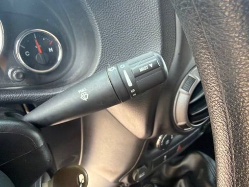 Used 2013 Jeep Wrangler Unlimited Sport w/ Mopar Black Appearance Group AWD/4WD image 26