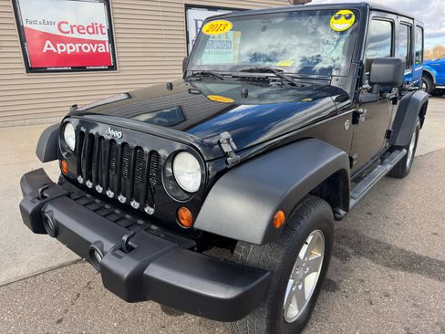 Used 2013 Jeep Wrangler Unlimited Sport w/ Dual Top Group image 1