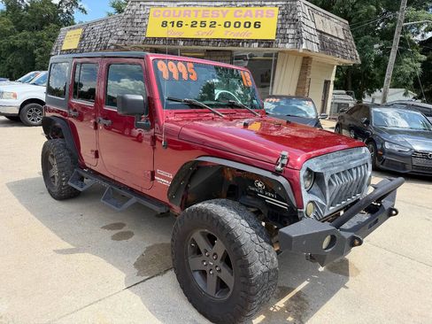 Used 2013 Jeep Wrangler Unlimited Sport AWD/4WD image 1