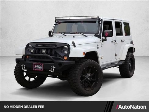 Used 2016 Jeep Wrangler Unlimited Sahara w/ Max Tow Package AWD/4WD image 1