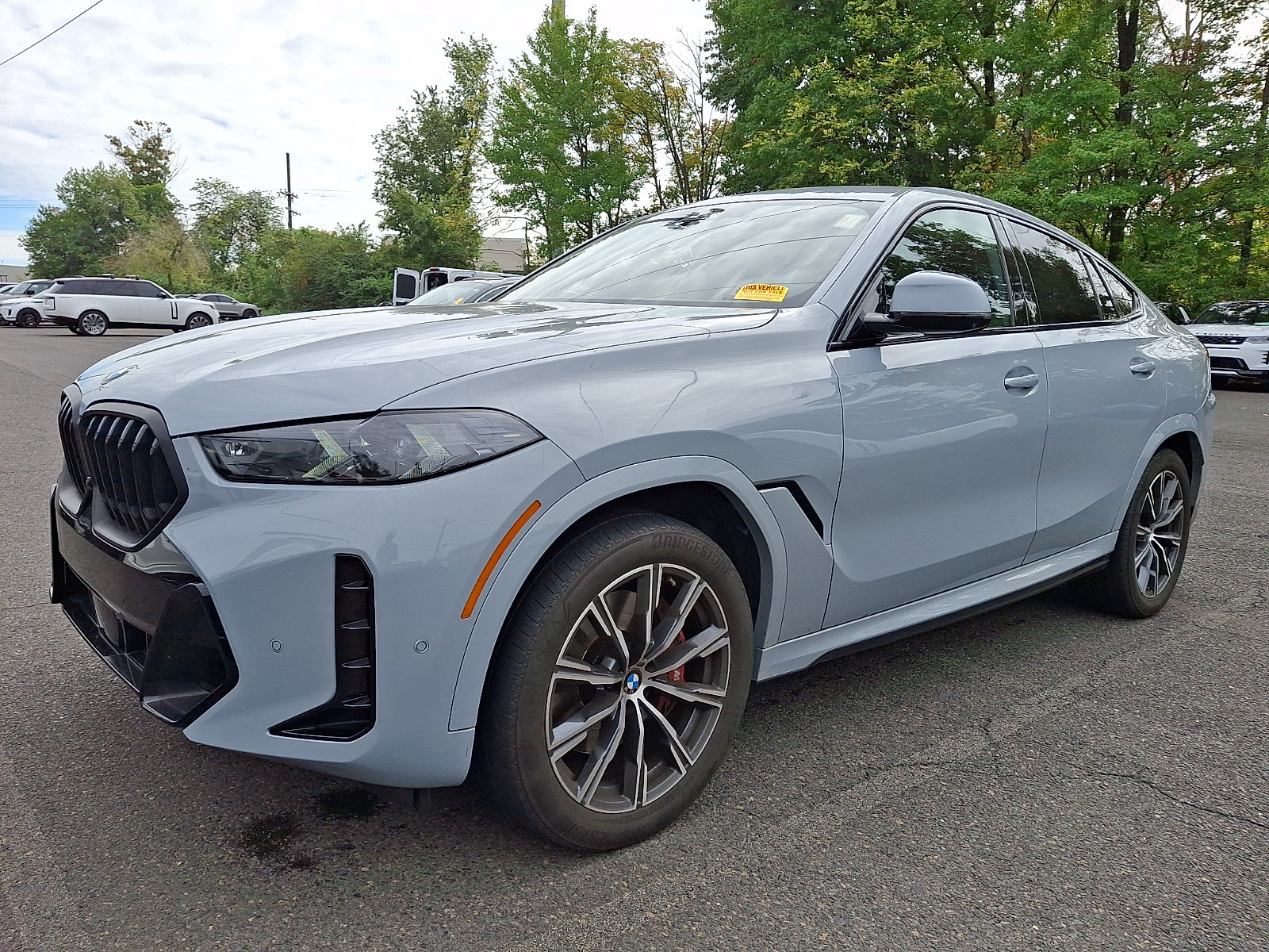 Used 2024 BMW X6 xDrive40i w/ M Sport Professional Package AWD/4WD image 1