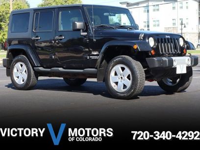 Used 2011 Jeep Wrangler Unlimited Sahara w/ Dual Top Group