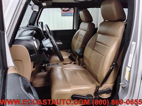 Used 2012 Jeep Wrangler Unlimited Sahara w/ Dual Top Group AWD/4WD image 10