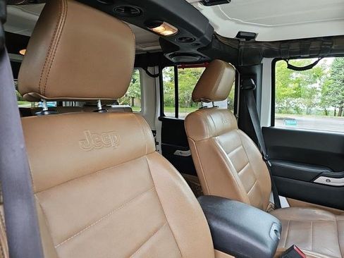 Used 2012 Jeep Wrangler Unlimited Sahara w/ Dual Top Group AWD/4WD image 11