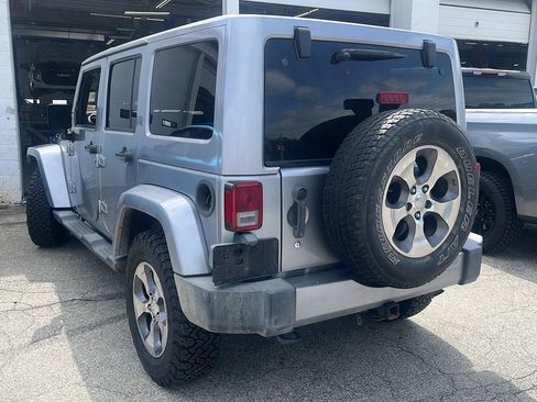 Used 2016 Jeep Wrangler Unlimited Sahara w/ Max Tow Package AWD/4WD image 6