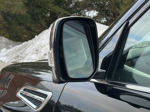 Certified 2019 Nissan Armada Platinum w/ Captain's Chairs Package image 12