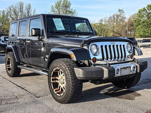 Used 2010 Jeep Wrangler Unlimited Sahara w/ Dual Top Group image 1