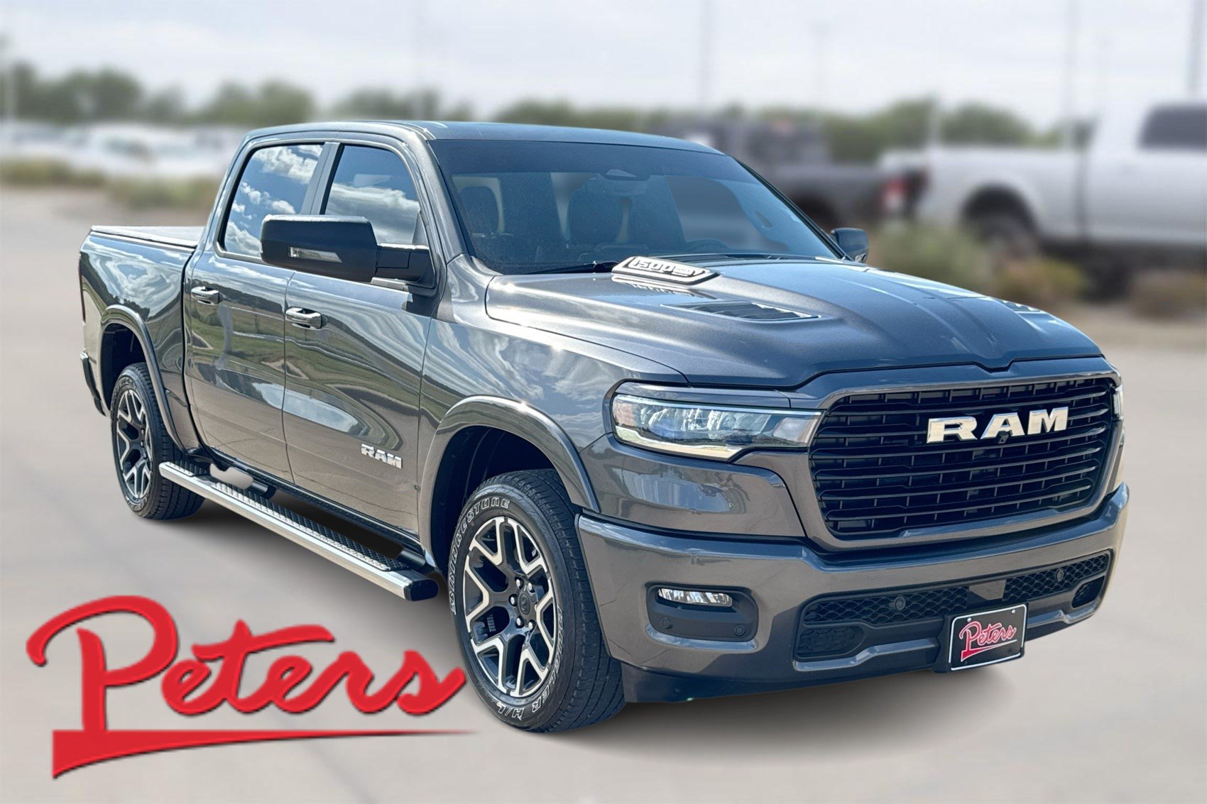 Used 2025 RAM 1500 Laramie AWD/4WD image 1