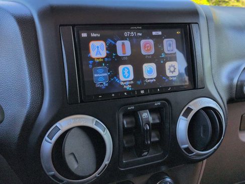 Used 2014 Jeep Wrangler Unlimited Sahara w/ Dual Top Group AWD/4WD image 25