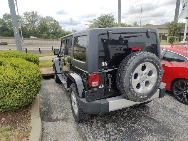 Used 2014 Jeep Wrangler Unlimited Sahara w/ Dual Top Group AWD/4WD image 8