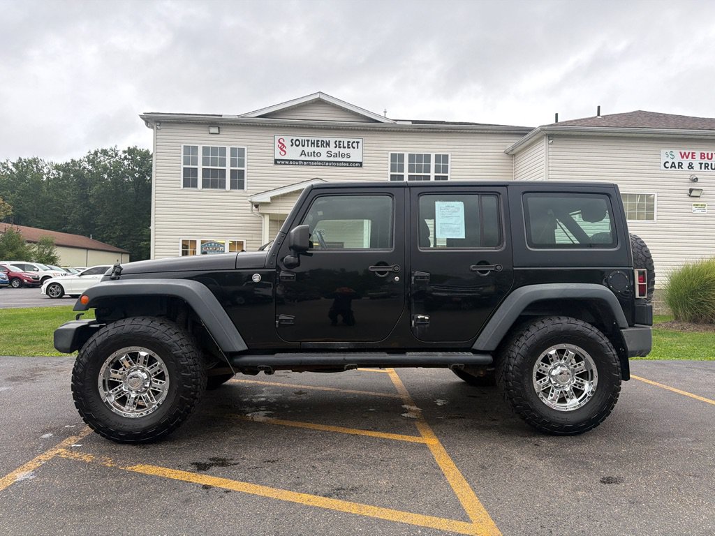 Used 2014 Jeep Wrangler Unlimited Sport w/ Mopar Black Appearance Group AWD/4WD image 1