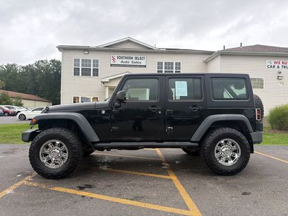 Used 2014 Jeep Wrangler Unlimited Sport w/ Mopar Black Appearance Group