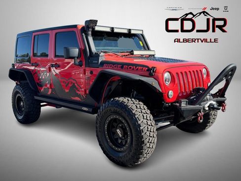 Used 2013 Jeep Wrangler Unlimited Sport image 1