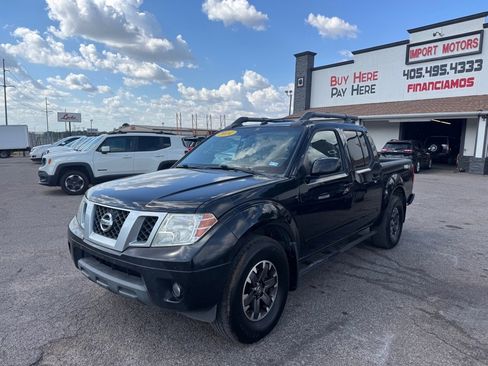 Used 2014 Nissan Frontier PRO-4X image 1