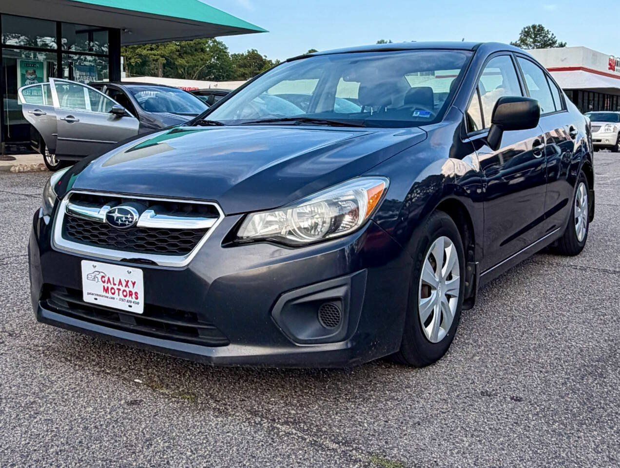 Used 2014 Subaru Impreza 2.0i AWD/4WD image 1