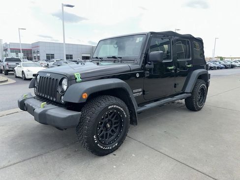 Used 2015 Jeep Wrangler Unlimited Sport w/ Mopar Black Appearance Group AWD/4WD image 4