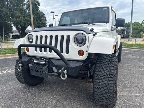 Used 2010 Jeep Wrangler Unlimited Sahara w/ Trailer Tow Group AWD/4WD image 1