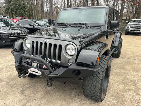 Used 2015 Jeep Wrangler Unlimited Sport image 1